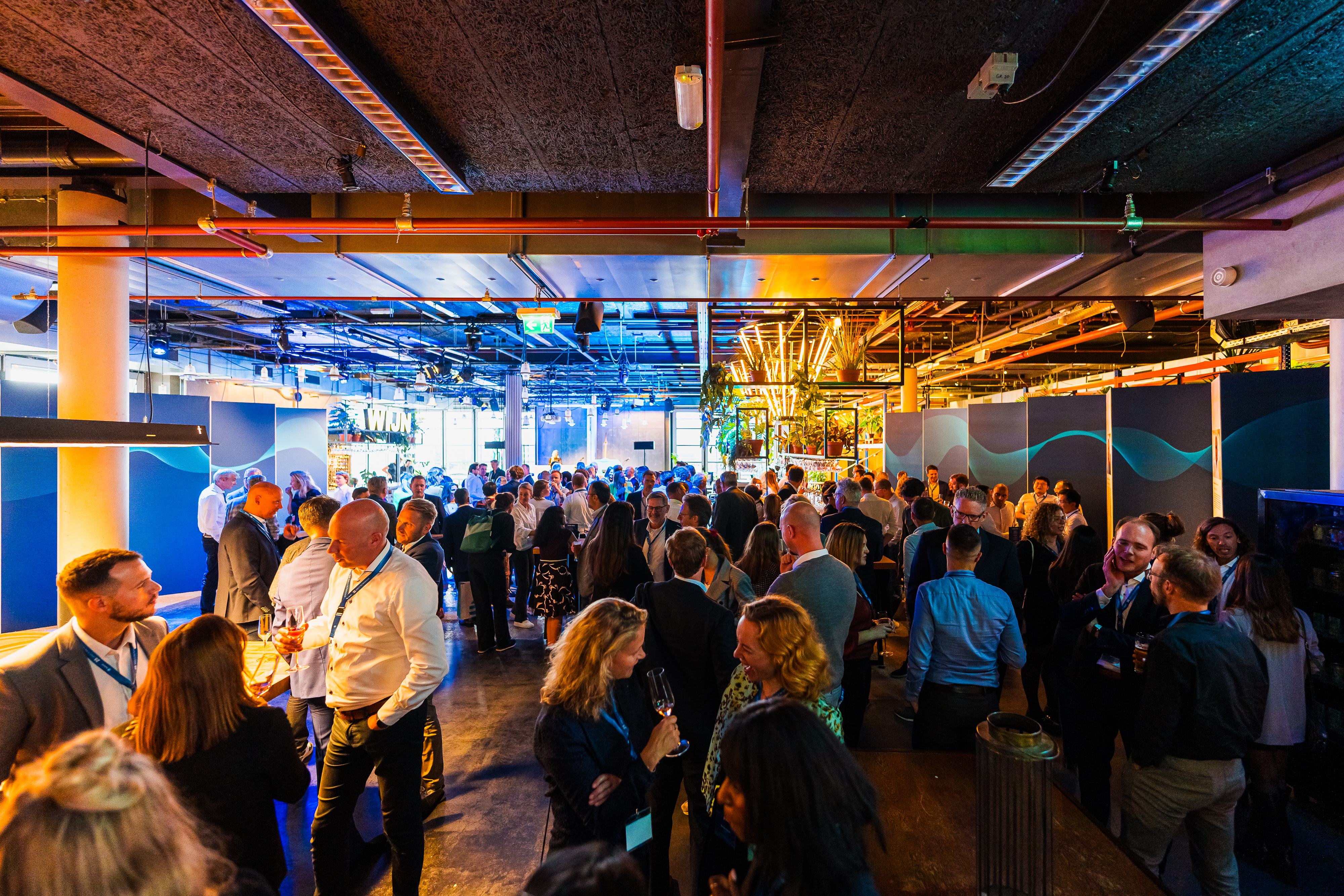 People mingling in a large room