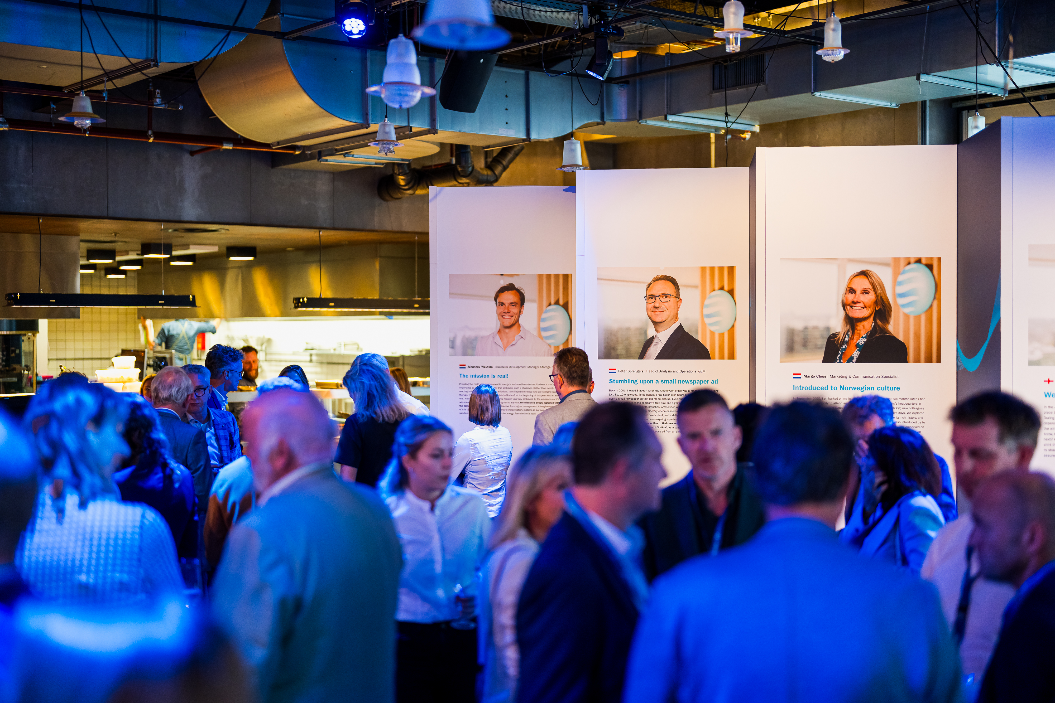 People mingling in a large room